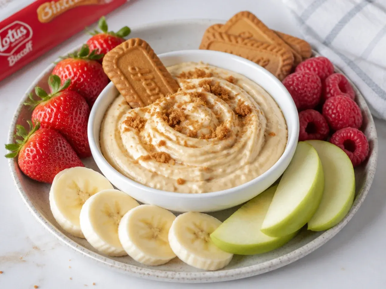 Lighter no-sugar-added biscoff cheesecake dip served with fresh fruit dippers