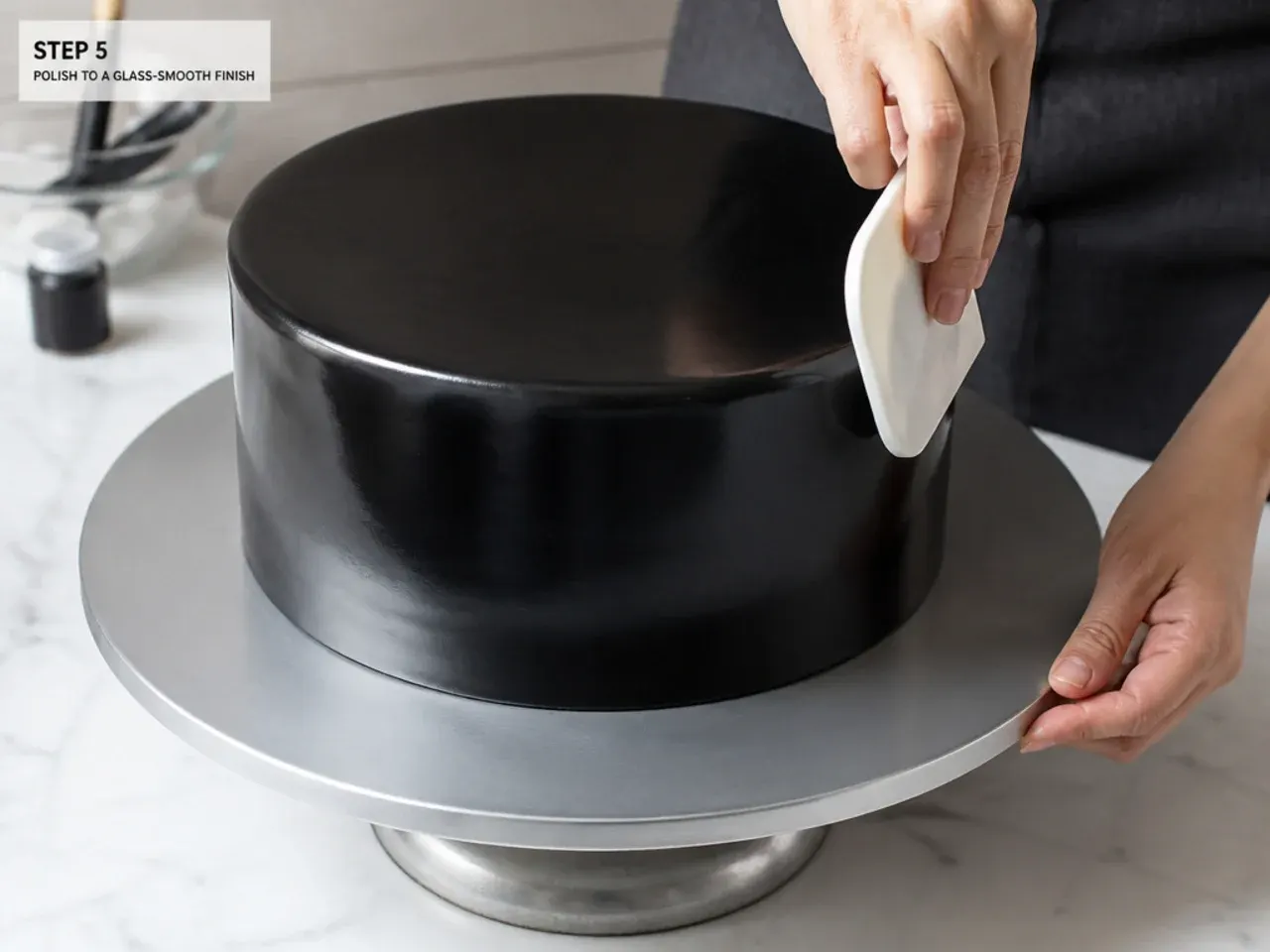 black cake decoration — step 5: polish to a glass-smooth finish