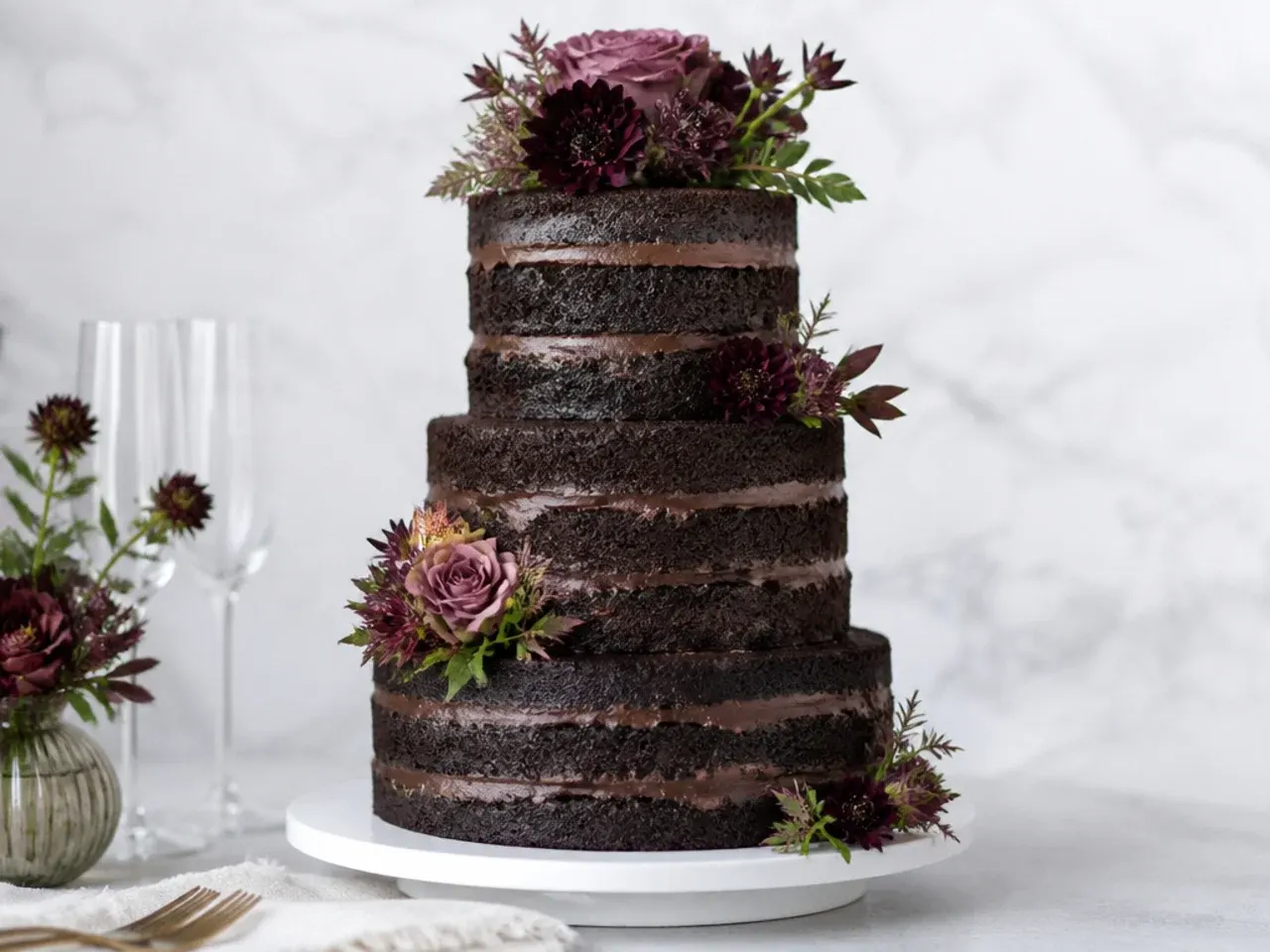 Rustic naked dark chocolate black wedding cake