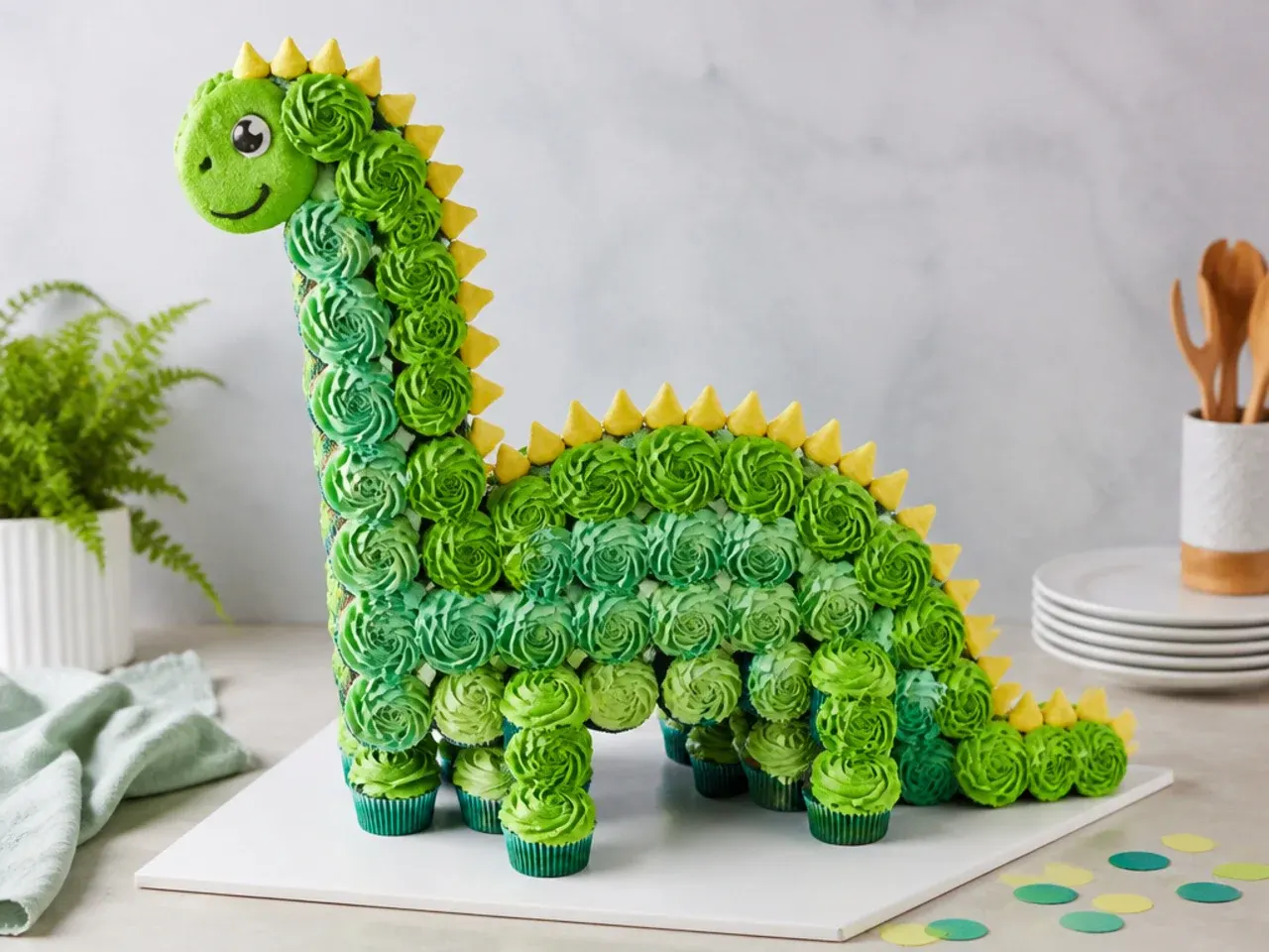 Dinosaur cupcake pull-apart cake idea shaped like a long-necked dino