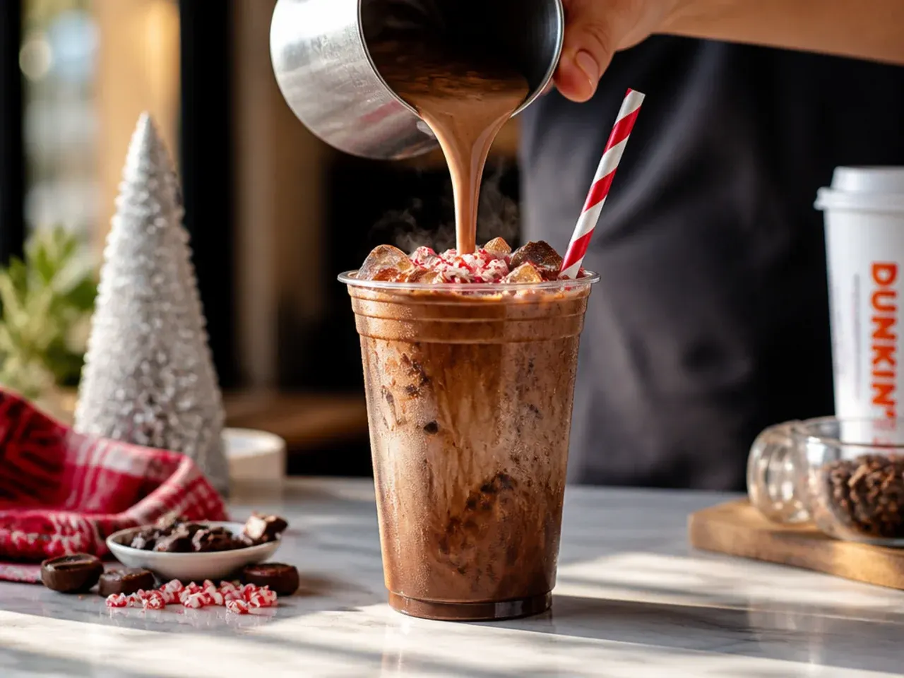Peppermint mocha topped with whipped cream and crushed candy cane