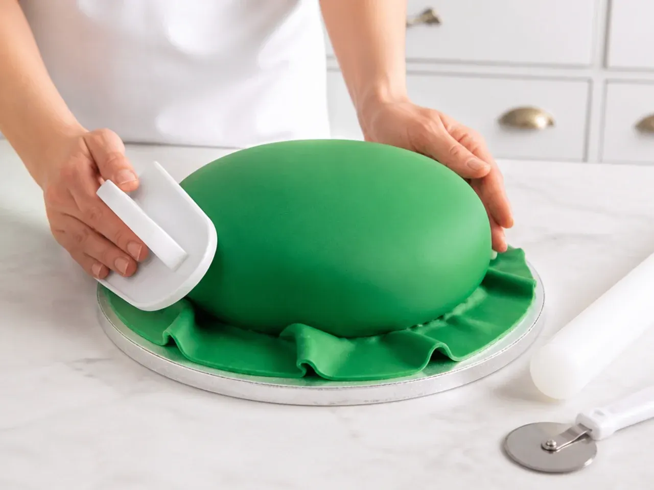 football birthday cake — step 6: colour and cover