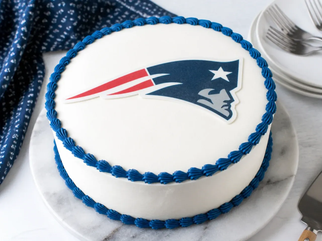 Football team logo cake idea made with a frozen buttercream transfer