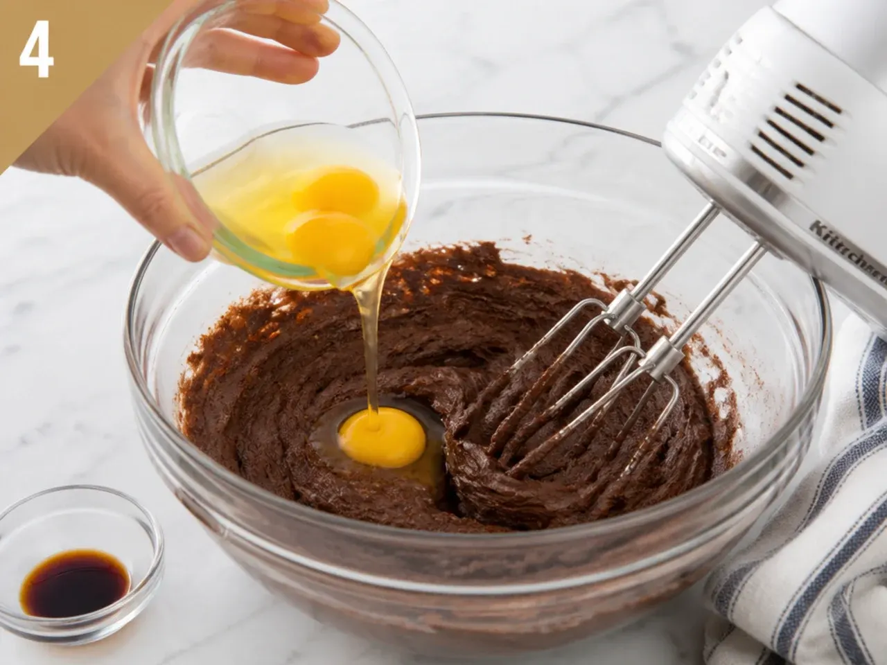 football cupcakes — step 4: add eggs and vanilla