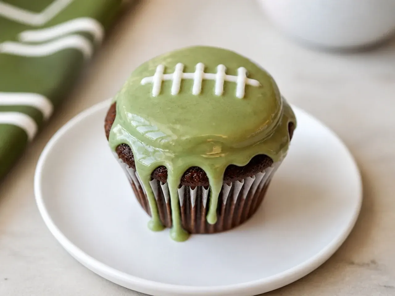 Common football cupcakes mistakes to avoid including melted buttercream on warm cupcakes
