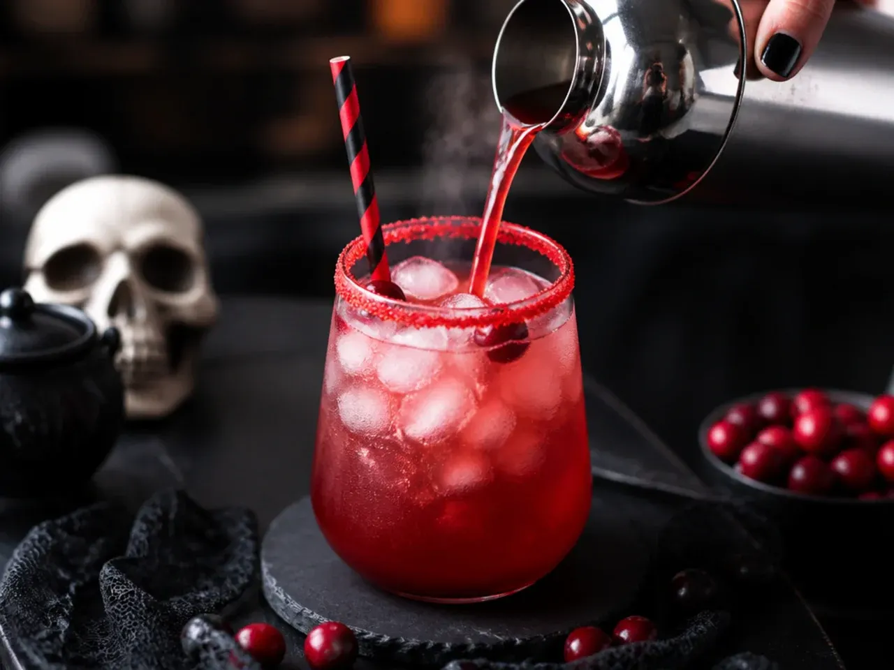 A tart red cranberry cooler in a sugar-rimmed glass