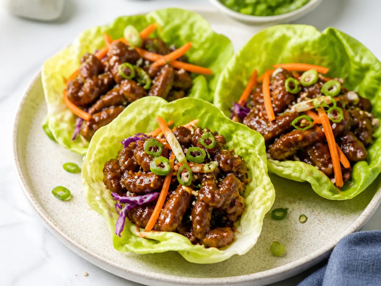 Playful healthy Mongolian beef lettuce cups with fresh toppings