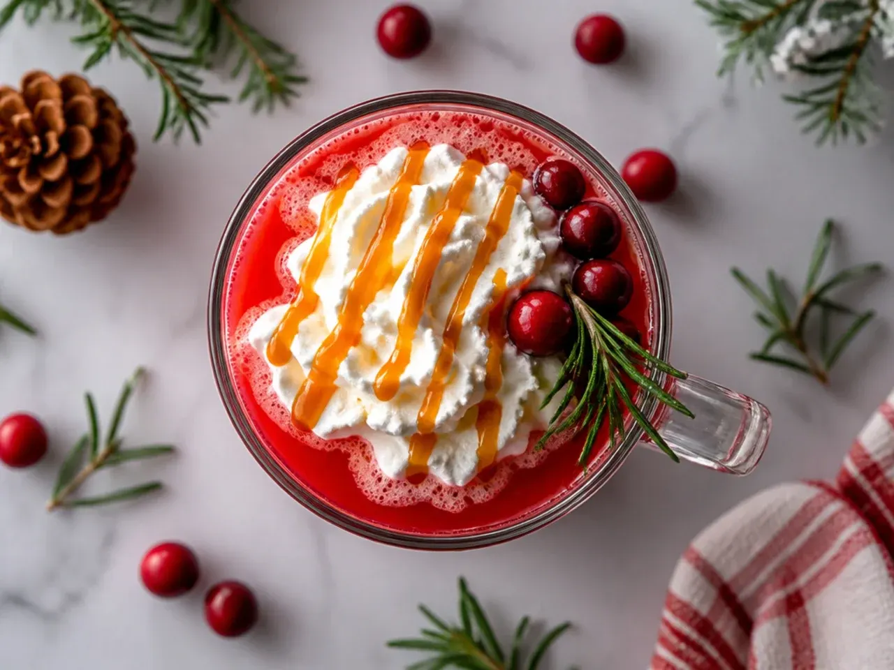 Large punch bowl of easy three-ingredient holiday party punch with a floating ice ring.