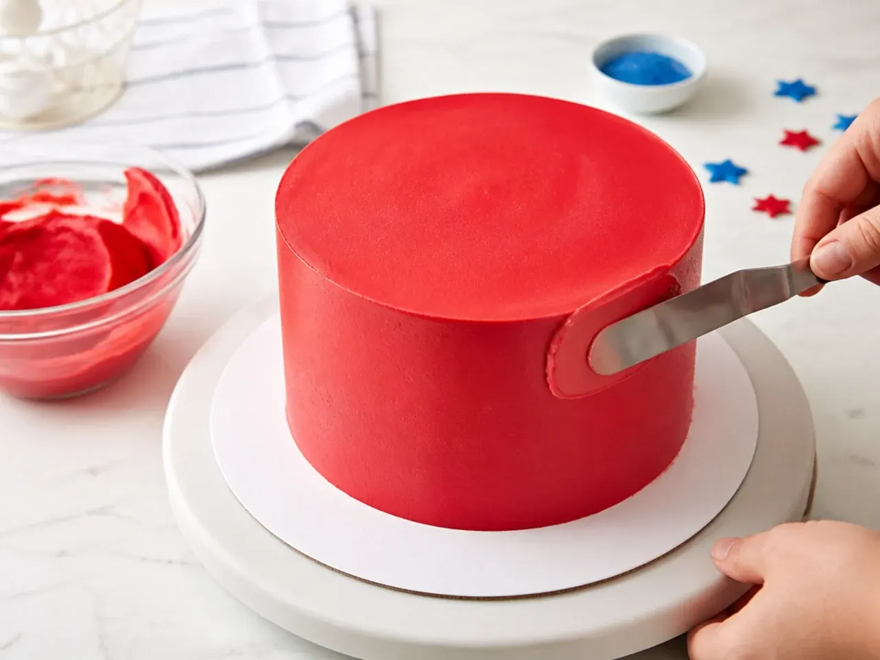 homemade spiderman cake — step 5: apply the smooth red coat