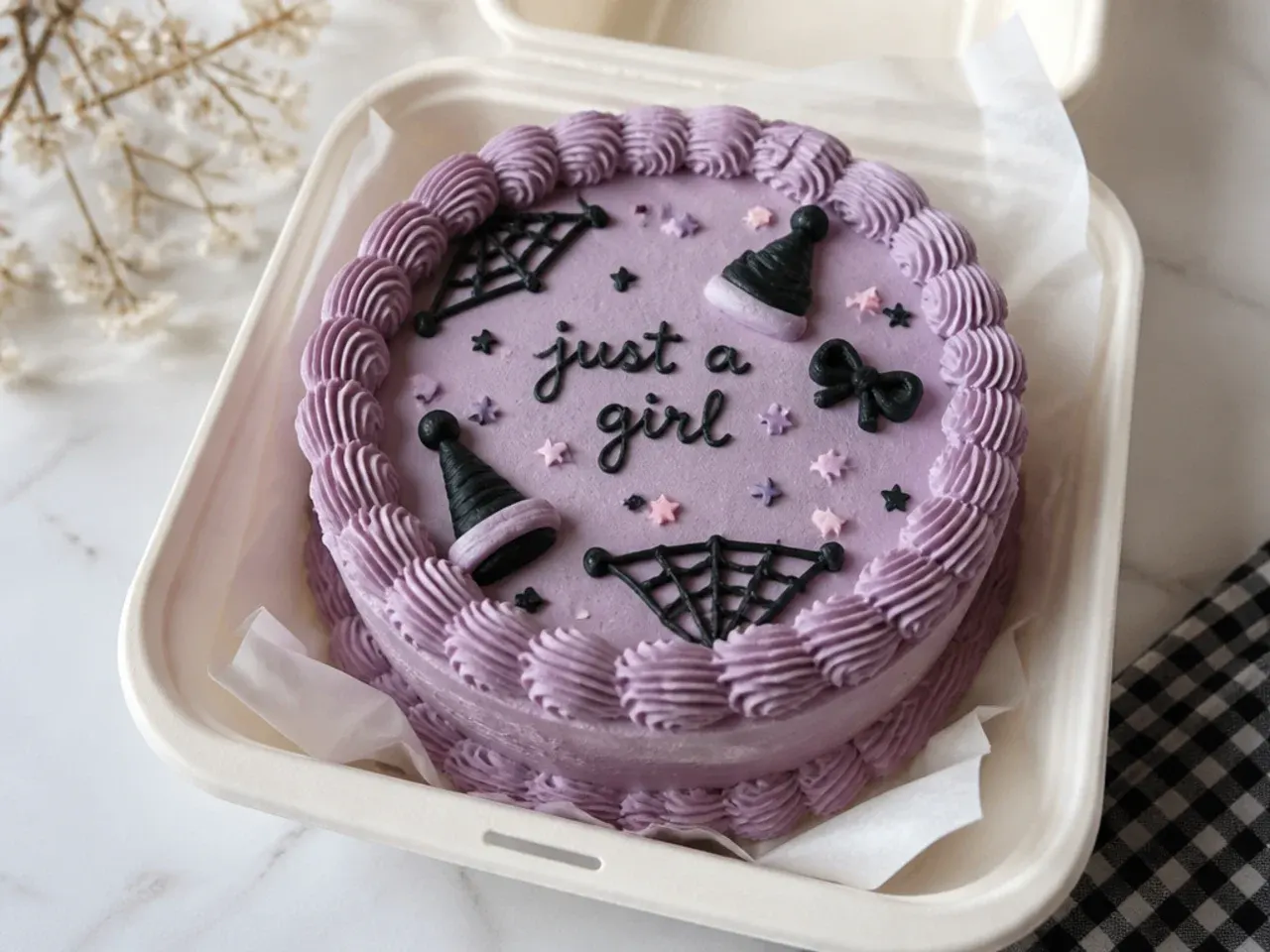 Vintage kuromi bento cake with heavy piped shell borders and dusty lilac frosting