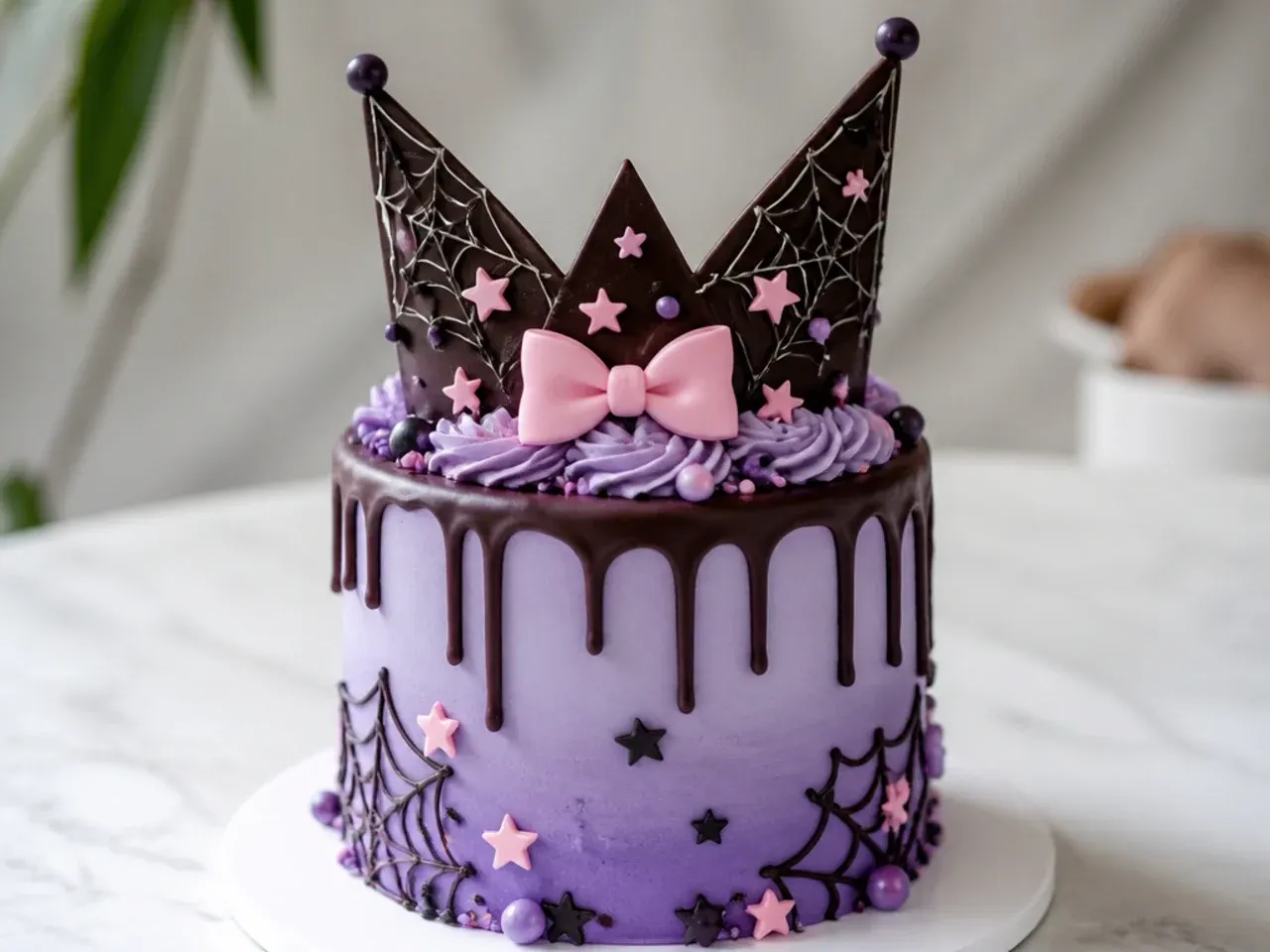 Rustic chocolate bark crown topper on a Kuromi inspired birthday cake
