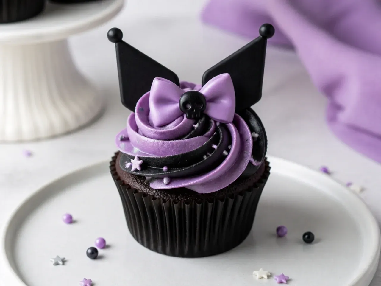 Classic Kuromi cupcakes with two-tone lavender and black buttercream swirl