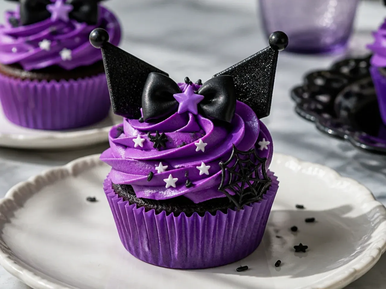 Bold neon-purple Kuromi cupcakes with black accents and white star sprinkles