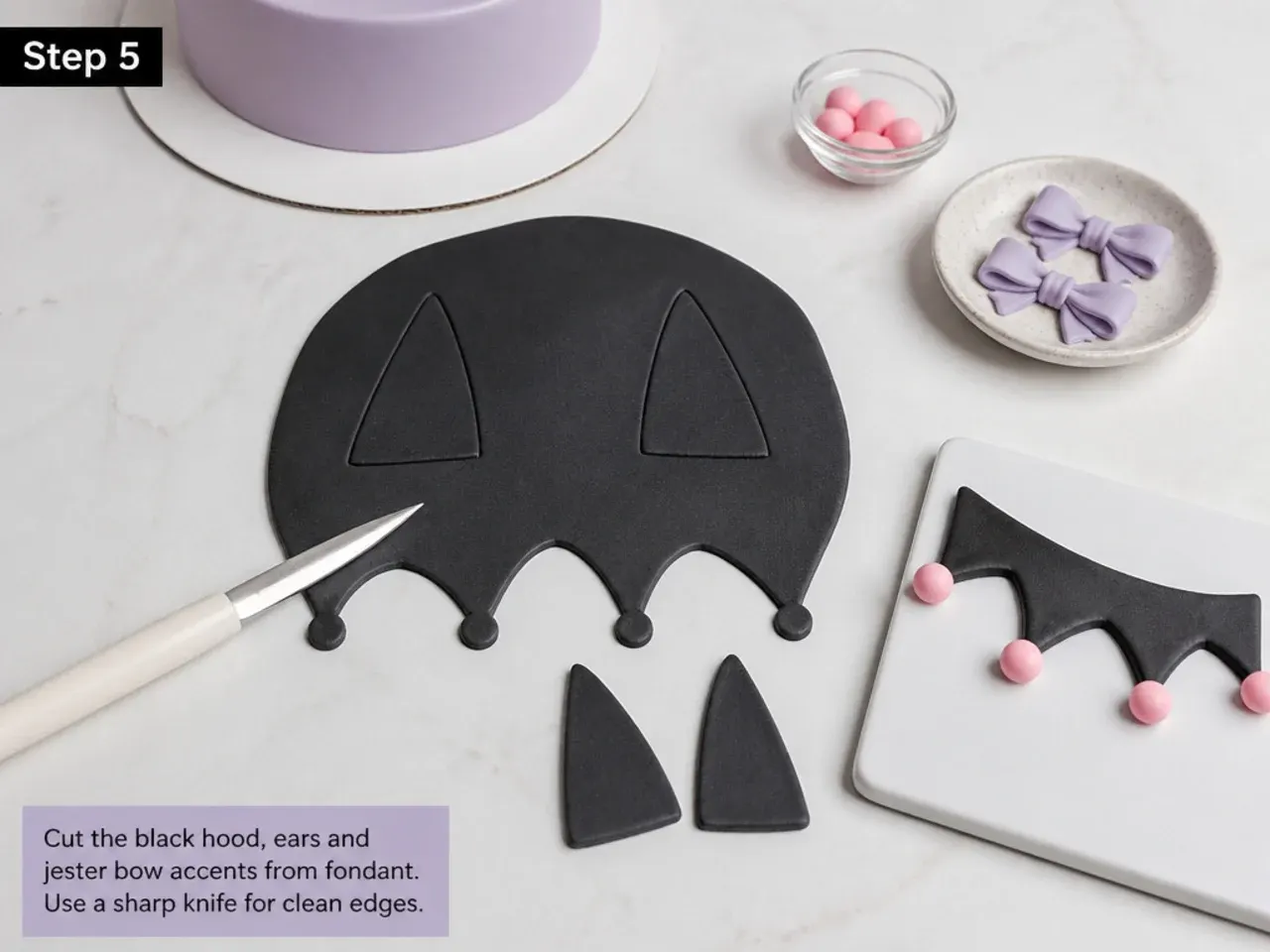 kuromi fondant cake — step 5: cut the black hood, ears and jester bow accents