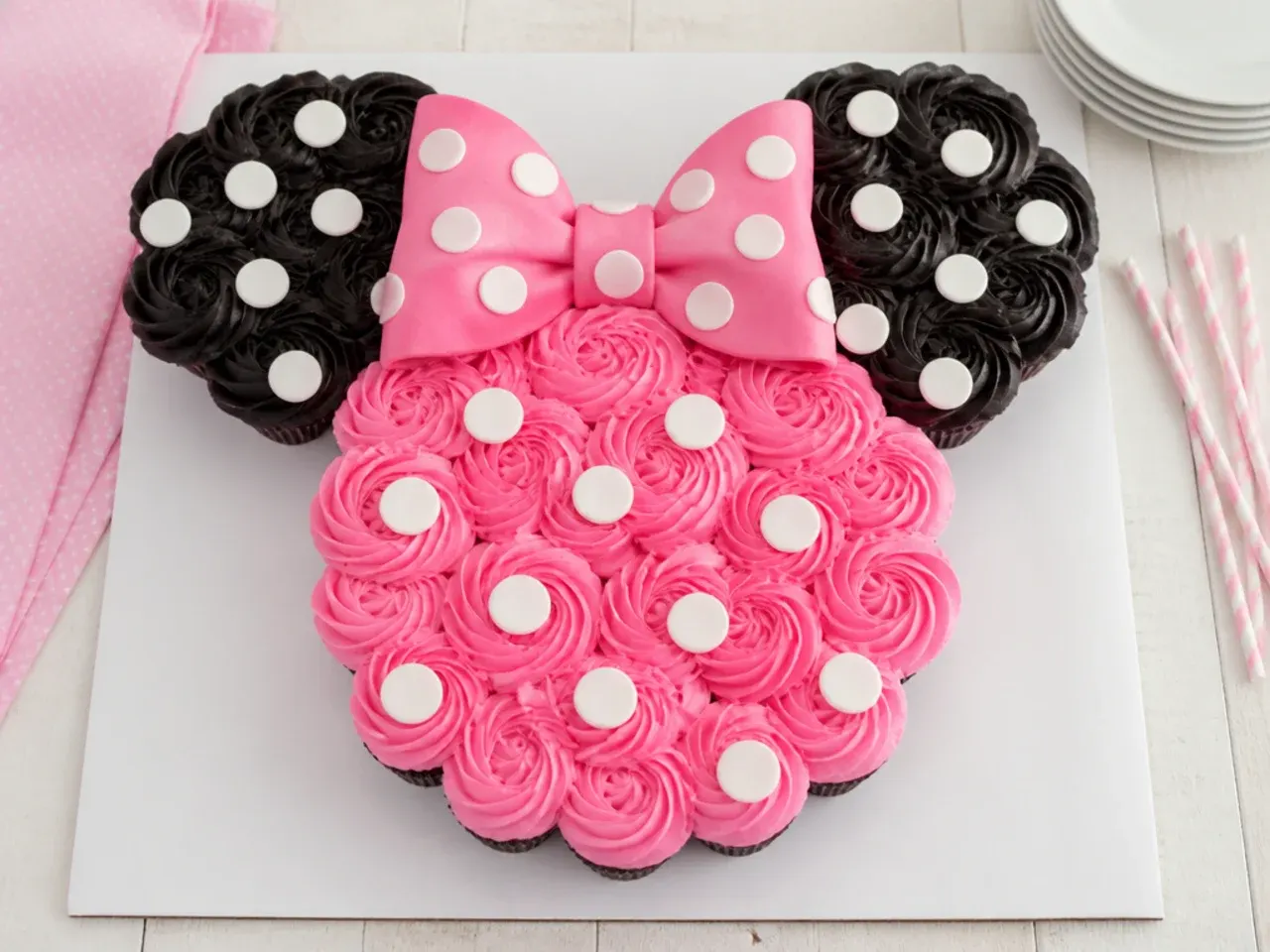 Creative pull-apart cupcake Minnie Mouse cake for girls arranged as a polka-dot shape