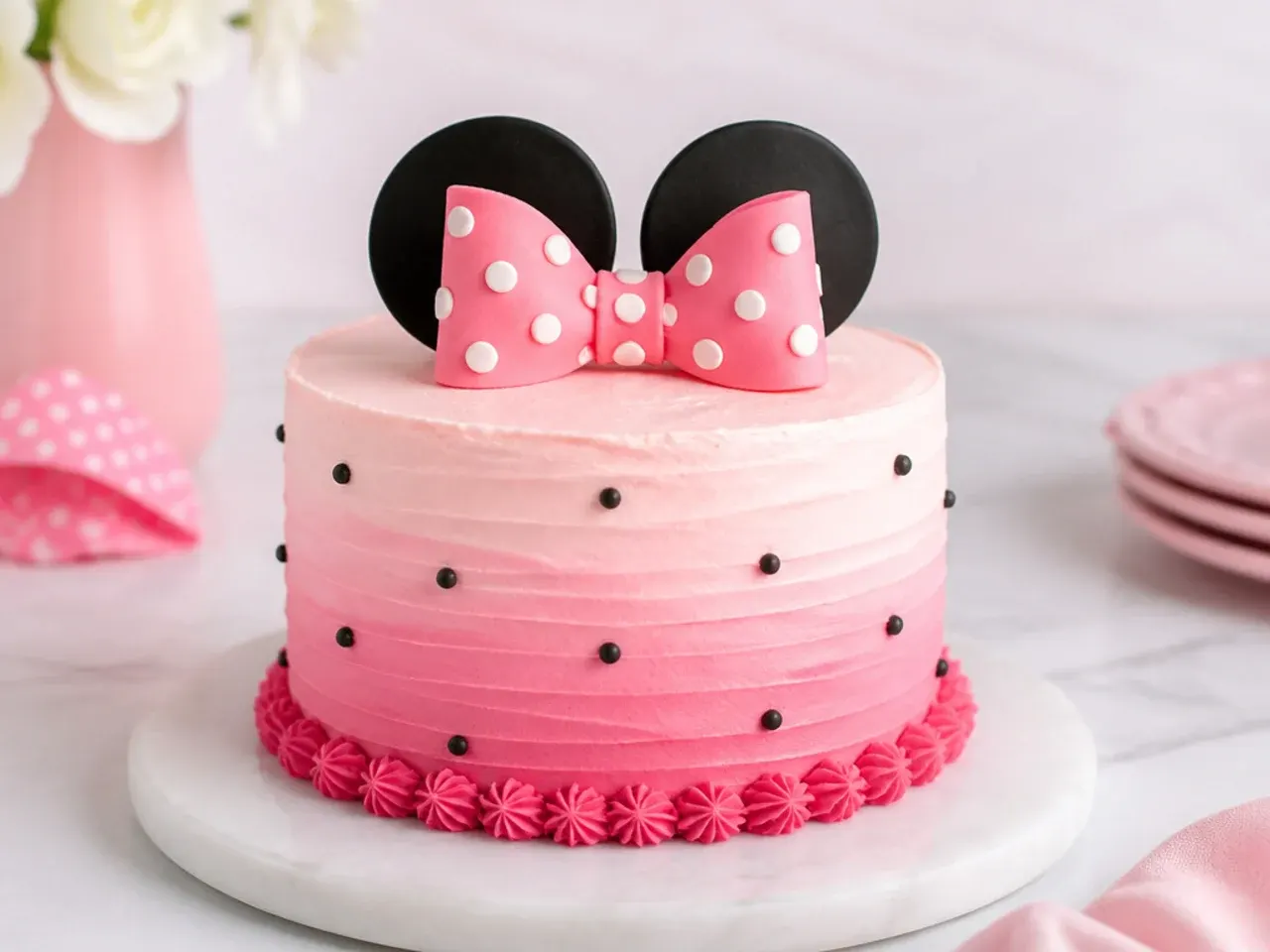 Pink ombre buttercream smash cake with black dot trim