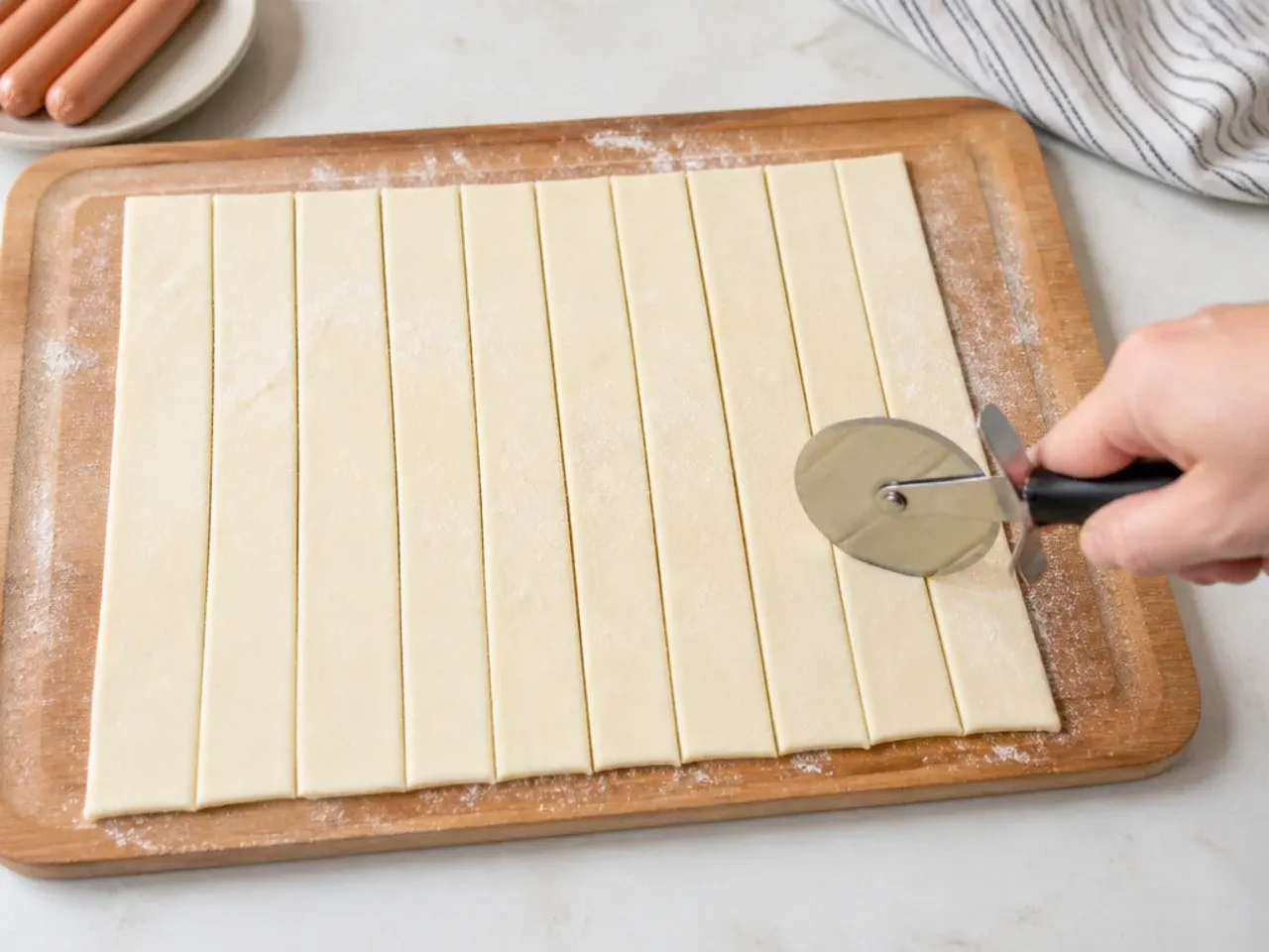 puff pastry pigs in a blanket — step 2: cut the pastry strips