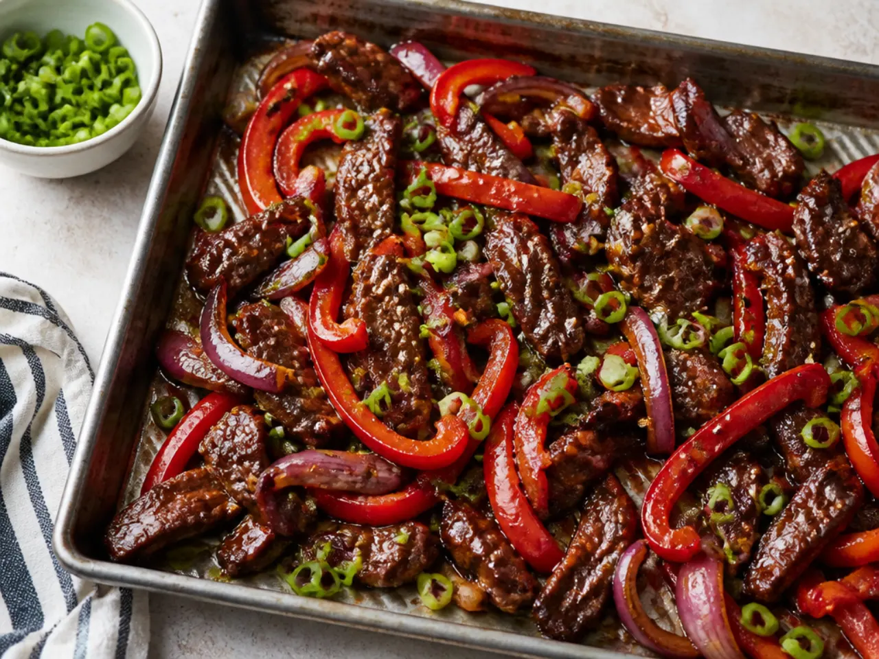 Sheet pan Mongolian beef with roasted peppers and red onion