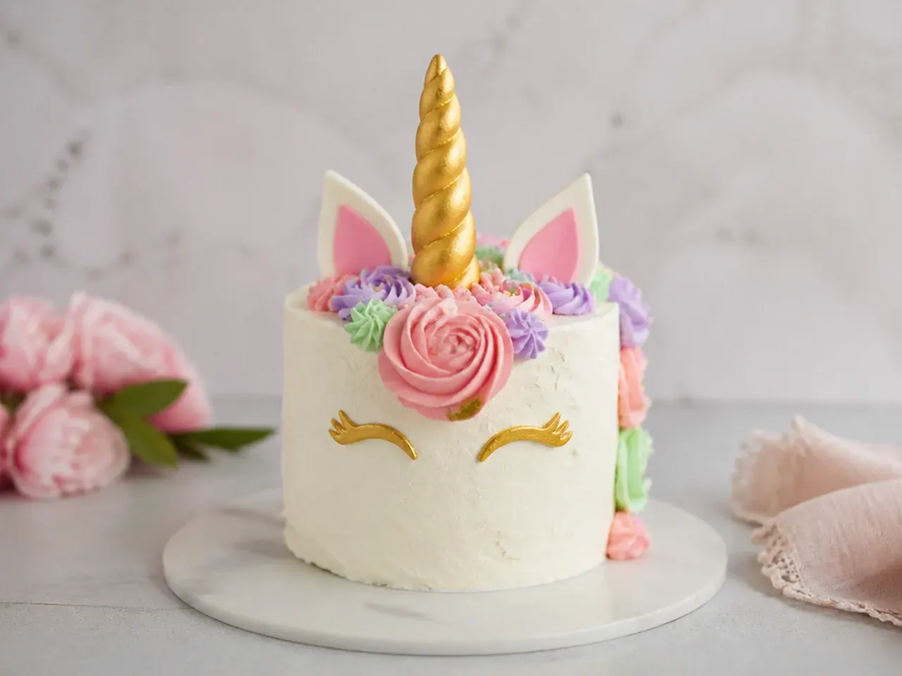 Charming mini smash simple unicorn cake for a first birthday