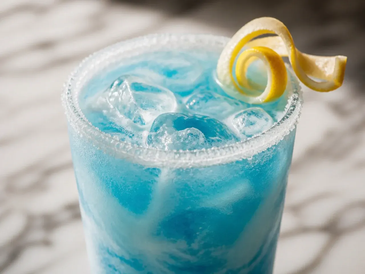 Ocean water drink topped with a thick coconut cream layer
