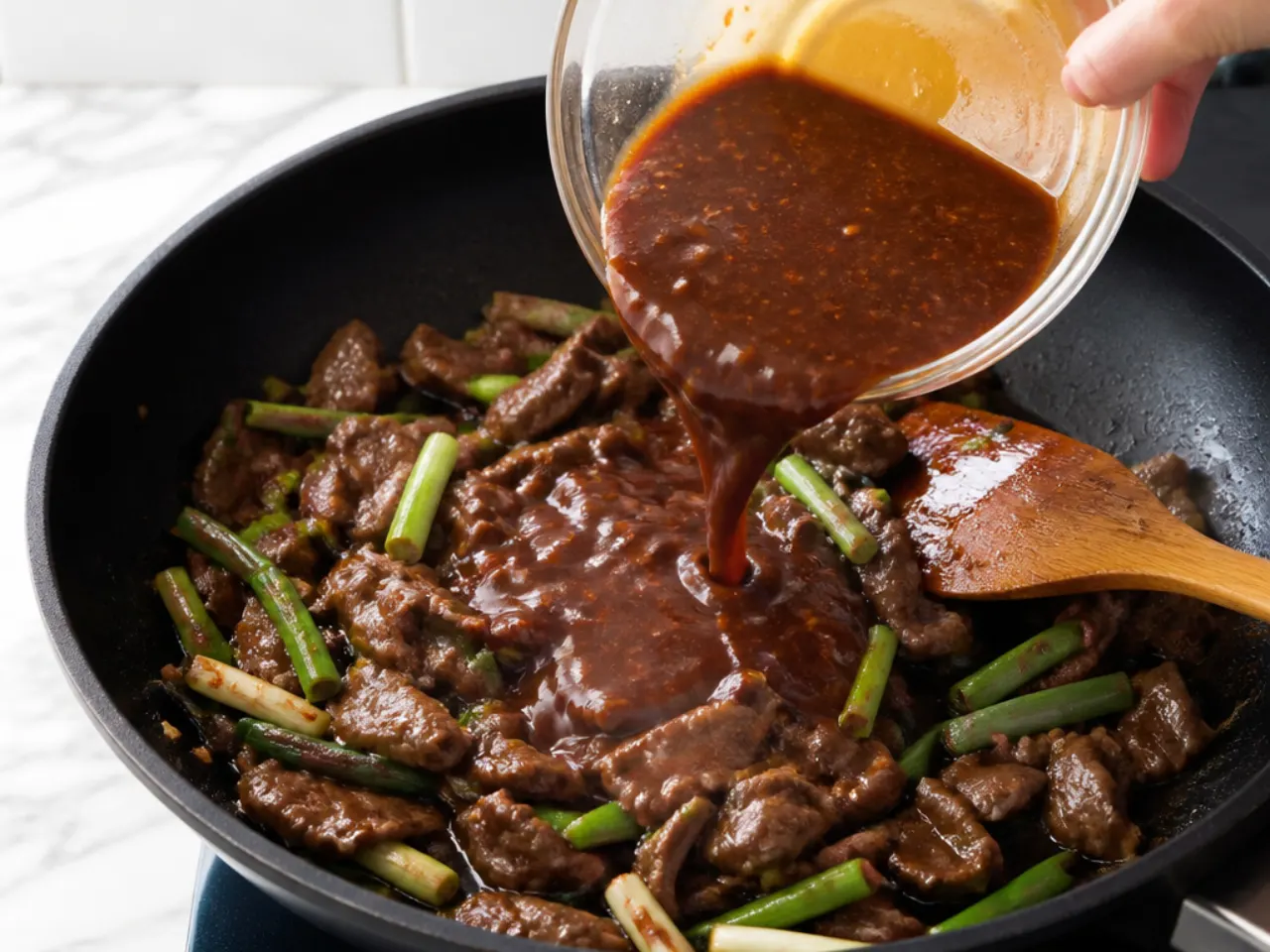 spicy mongolian beef — step 5: add the sauce and heat