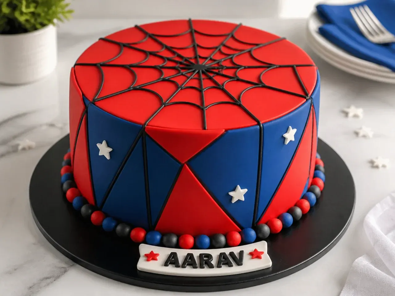Modern geometric Spiderman cake for boys with sharp red and blue triangular panels