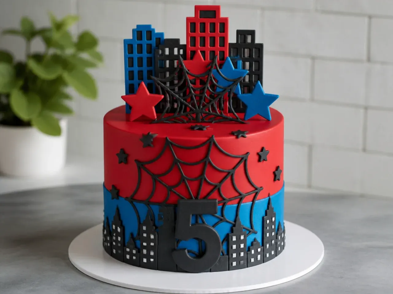 Colorful red and blue color-block spiderman cake topper made from fondant shapes