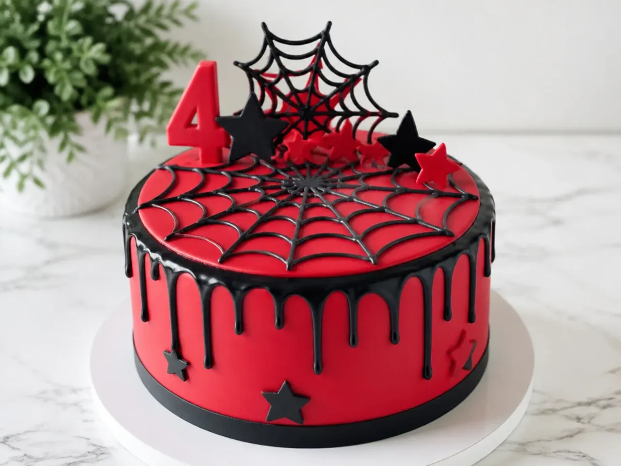Classic two-tone red drip and black web spiderman cake topper design