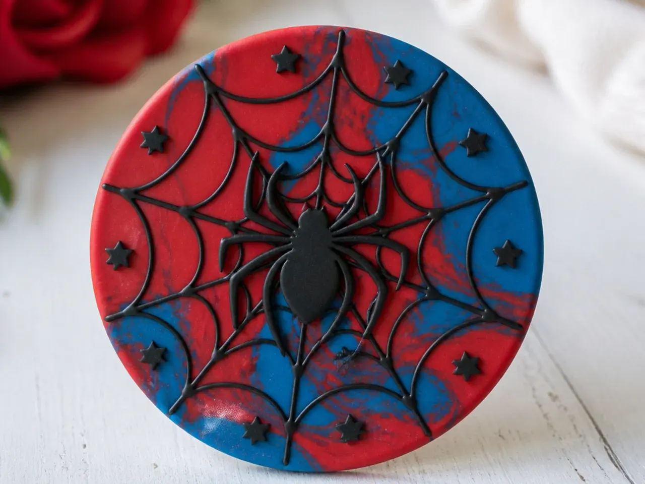 Elegant marbled red and blue fondant spiderman cake topper disc