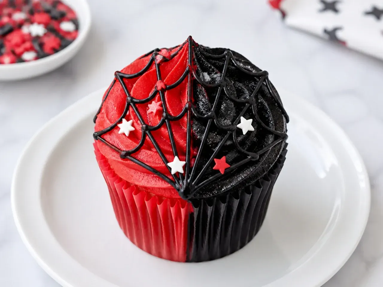 Bold two-tone red and black split Spiderman cupcakes