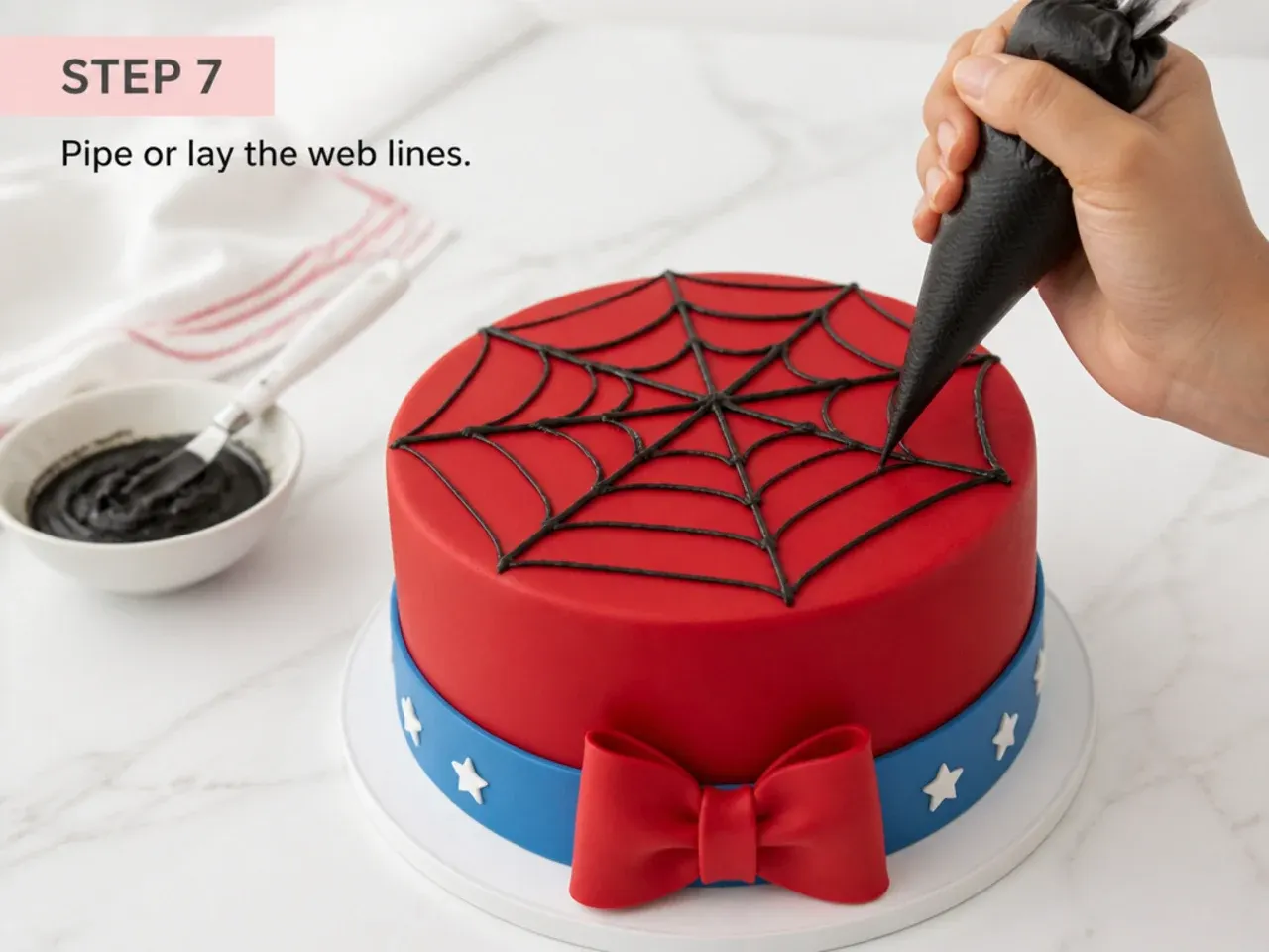spiderman fondant cake — step 7: pipe or lay the web lines