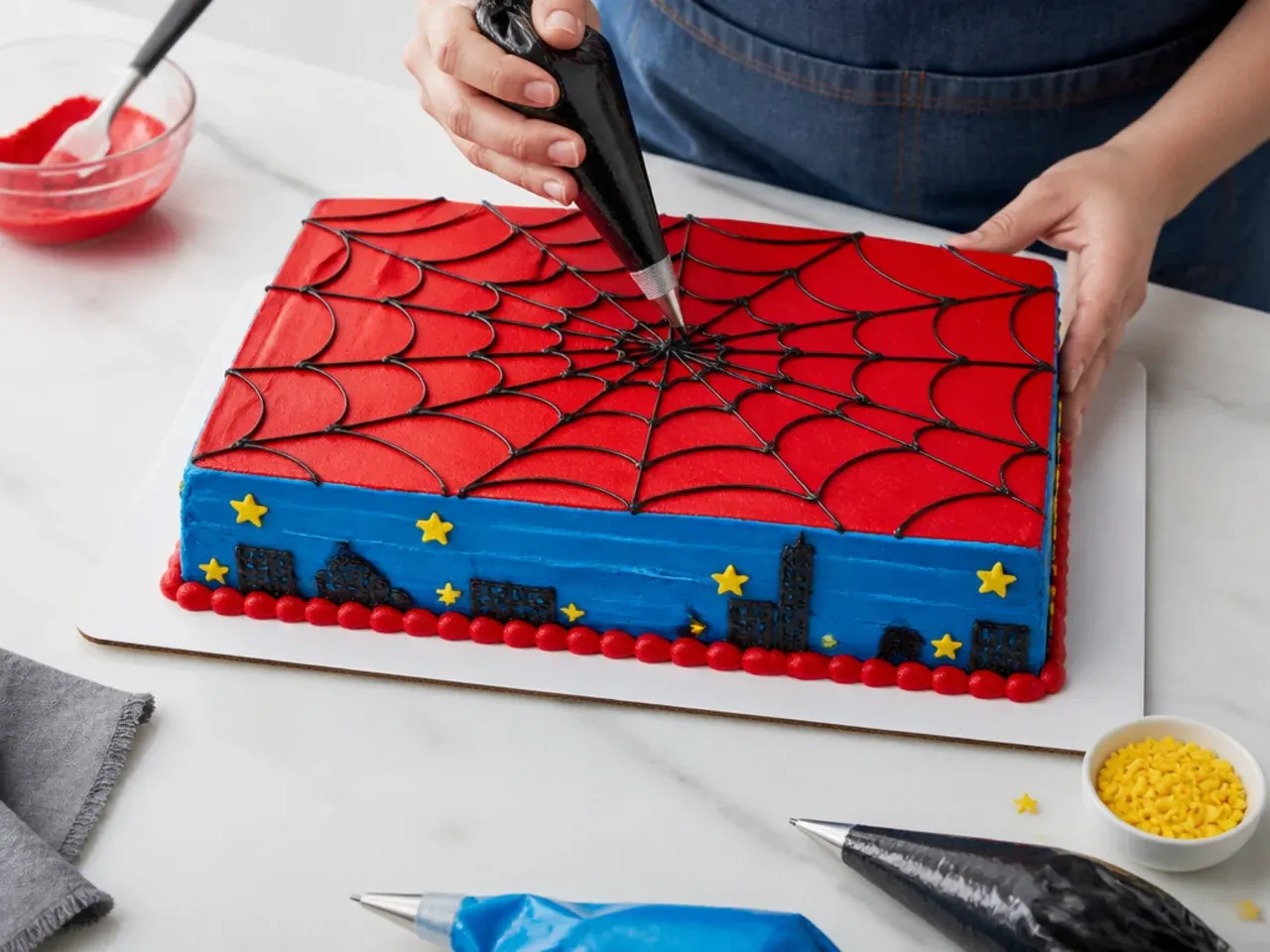 spiderman sheet cake — step 7: frost, chill, and pipe