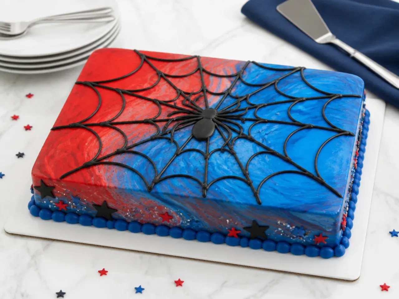 Creative marbled red and blue fondant Spiderman sheet cake with black web strings