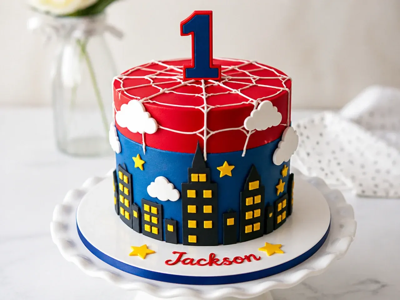 Whimsical city skyline spiderman-inspired smash cake with piped clouds and web
